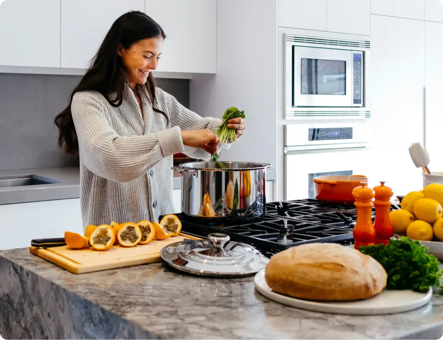 Woman cooking in a modern kitchen