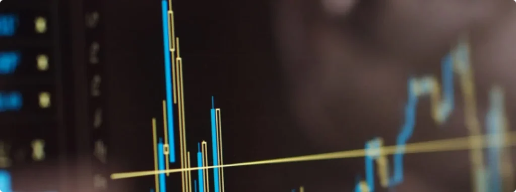Close-up of a digital graph with blue and yellow data lines