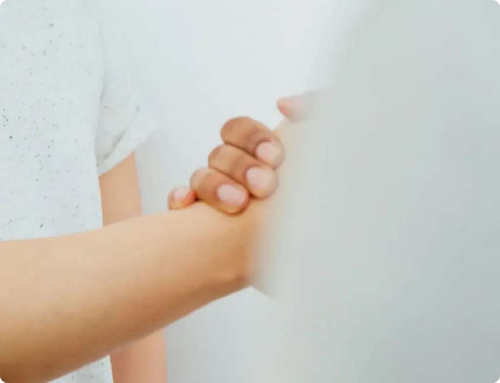 Close-up of a handshake