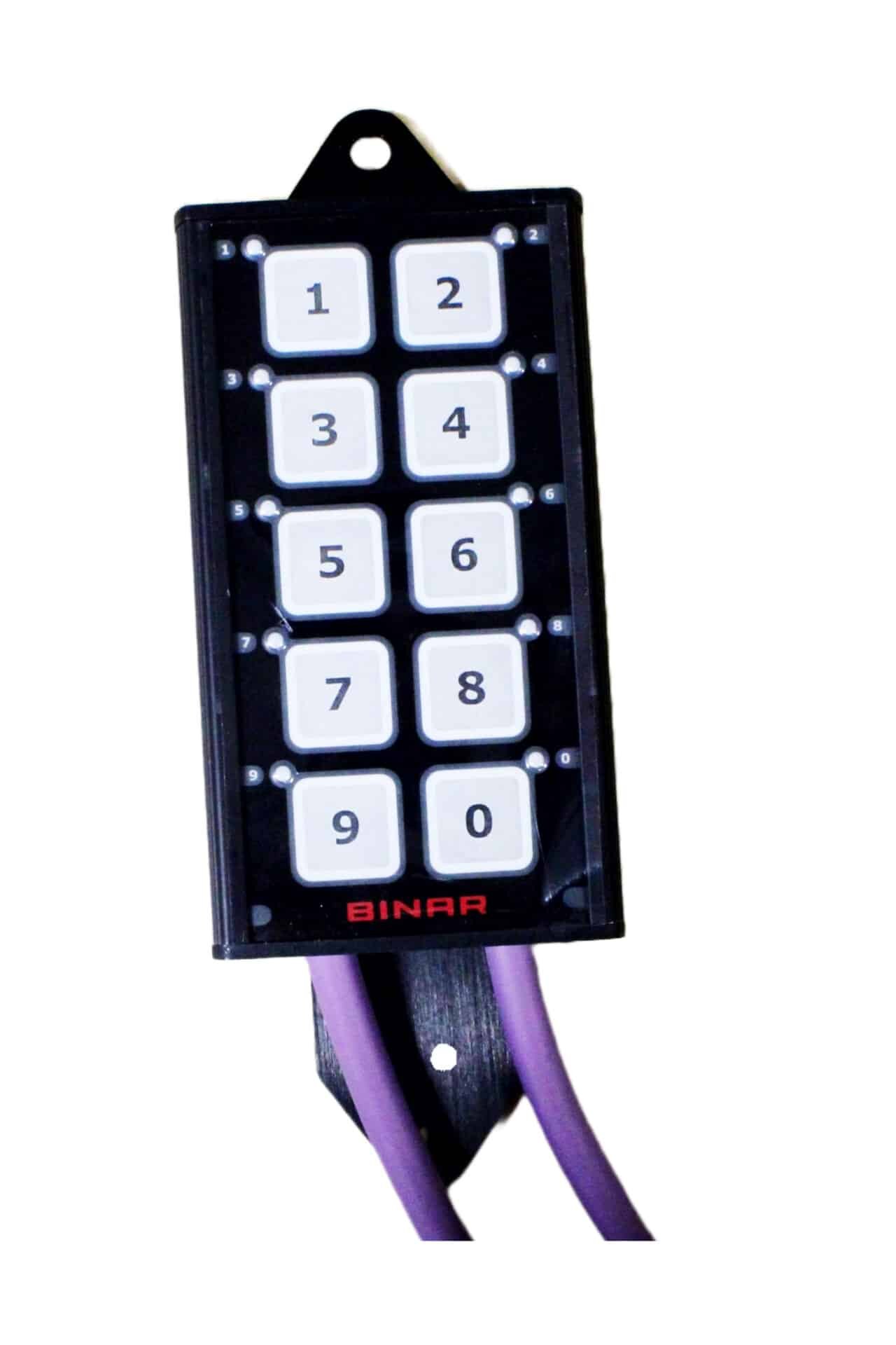 Binar button panel with numbers and two purple cables