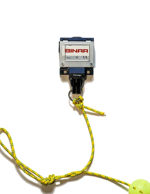 Binar industrial product with a yellow pull cord on a white background